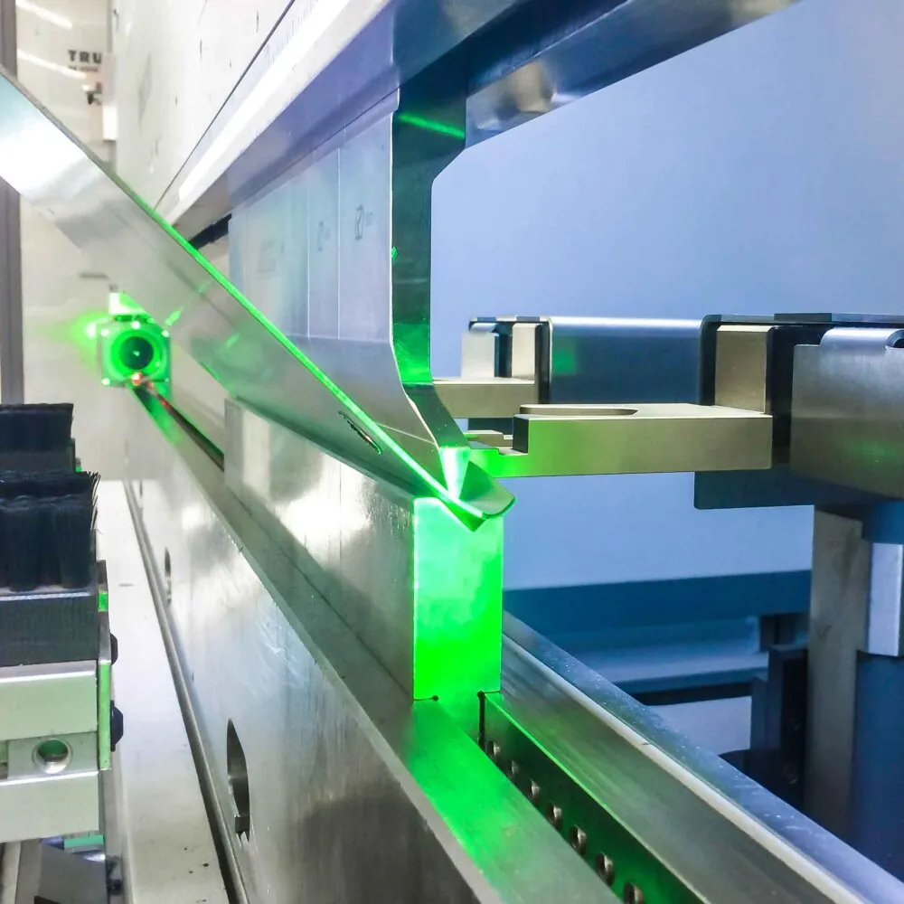 New metal bending press brake offers greater precision angles and added capacity.
